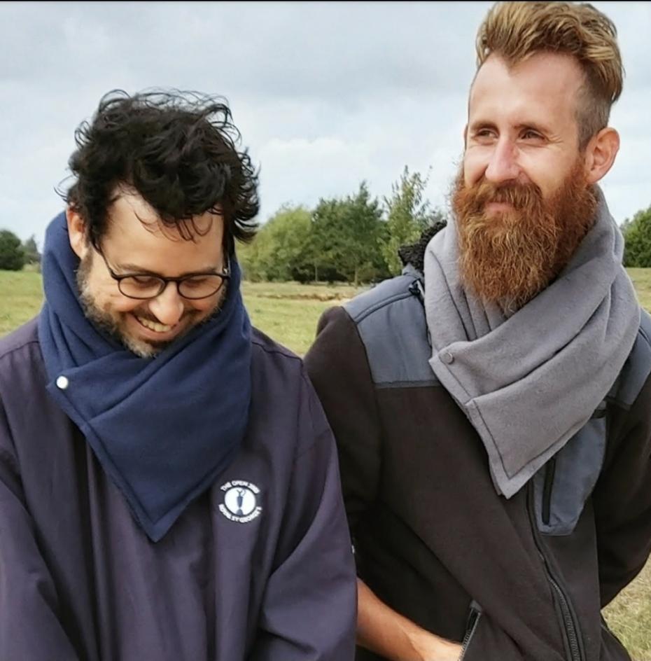 Polar Fleece Pocket Scarf in Grey & Navy modelled by golfers on the course.